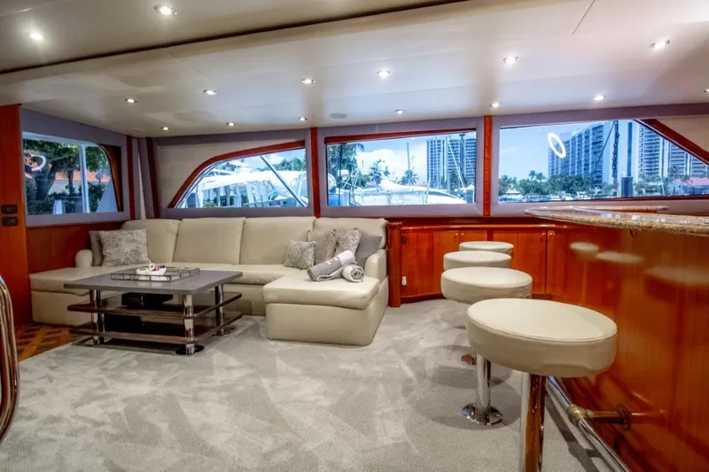Reel Deal Yacht Photos Pics Luxurious interior of a 2005 Sea Force Sportfish yacht with plush seating and modern decor.