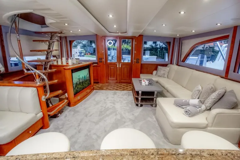 Reel Deal Yacht Photos Pics Luxurious 2005 Sea Force Sportfish yacht interior with elegant seating and modern amenities.