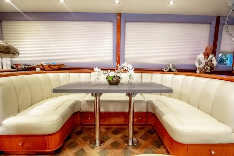 Reel Deal Yacht Photos Pics Luxurious 2005 Sea Force Sportfish yacht interior with elegant dining area and plush seating.