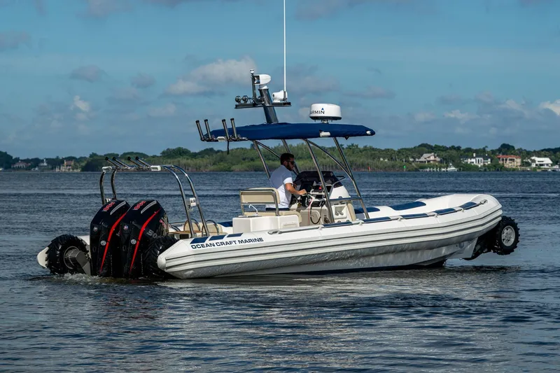 No Name Yacht Photos Pics 2023 Ocean Craft 38 boat on water with dual outboard motors.
