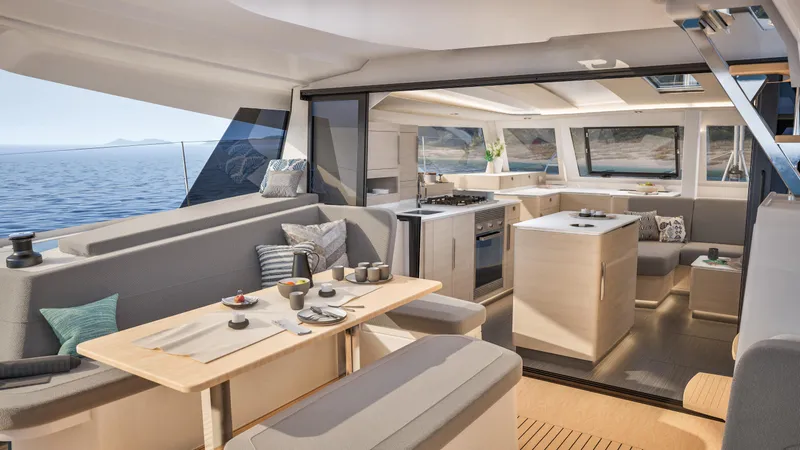 Fp 44 In St. Thomas, Usvi. Ex-factory April 2026 Yacht Photos Pics Luxurious interior of 2026 Fountaine Pajot 44 catamaran with modern kitchen and dining area.
