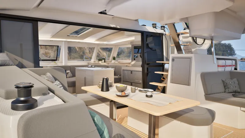 Fp 44 In St. Thomas, Usvi. Ex-factory April 2026 Yacht Photos Pics Luxurious interior of 2026 Fountaine Pajot 44 catamaran with modern dining area and seating.