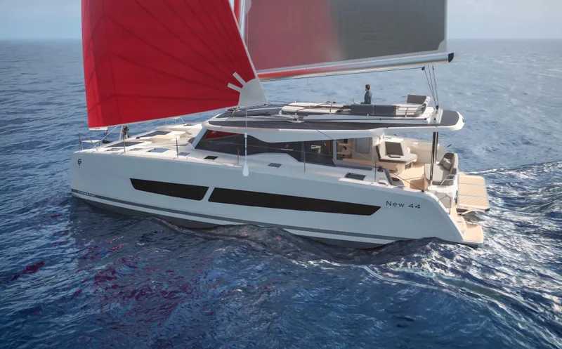 Fp 44 In St. Thomas, Usvi. Ex-factory April 2026 Yacht Photos Pics 2026 Fountaine Pajot 44 catamaran with red sails on open sea.