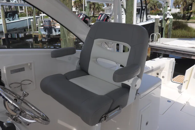 Reel Grateful Yacht Photos Pics Captain's chair on 2021 Albemarle 31 DC boat, featuring sleek design and comfortable seating.