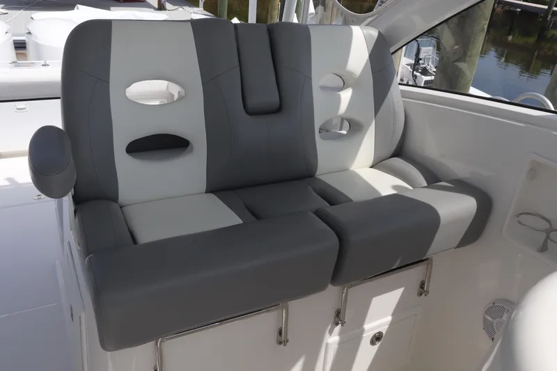 Reel Grateful Yacht Photos Pics 2021 Albemarle 31 DC boat seat with gray and white upholstery.