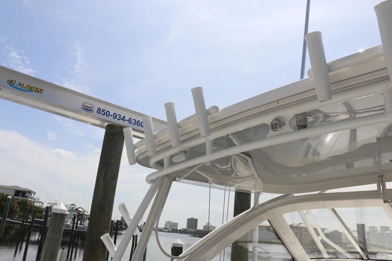 Reel Grateful Yacht Photos Pics 2021 Albemarle 31 DC boat detail with rod holders and marina background.