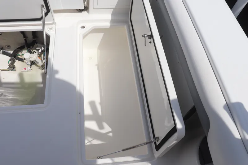 Reel Grateful Yacht Photos Pics 2021 Albemarle 31 DC boat storage compartments and mechanical access.
