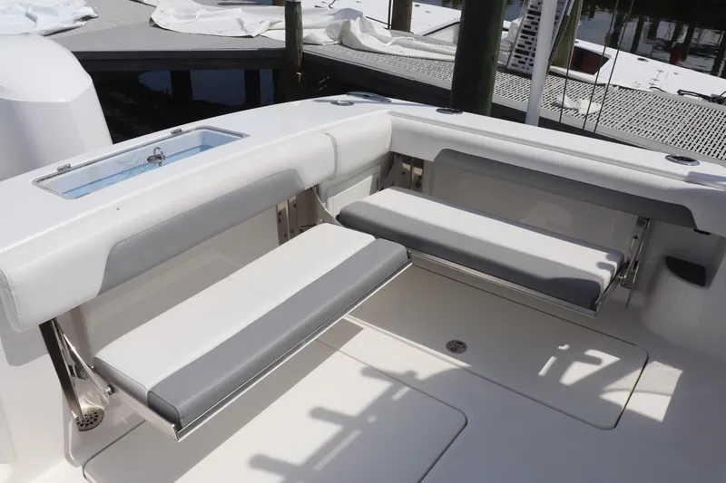 Reel Grateful Yacht Photos Pics 2021 Albemarle 31 DC boat with foldable seating and storage compartments.