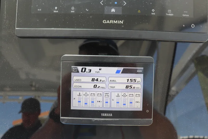 Reel Grateful Yacht Photos Pics Garmin and Yamaha displays on 2021 Albemarle 31 DC boat dashboard showing speed and fuel data.
