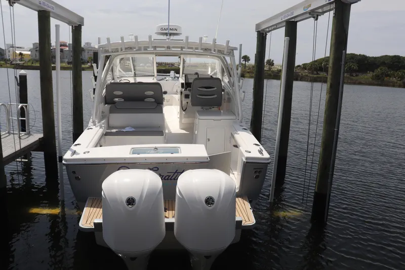 Reel Grateful Yacht Photos Pics 2021 Albemarle 31 DC boat docked with twin engines and Garmin equipment.