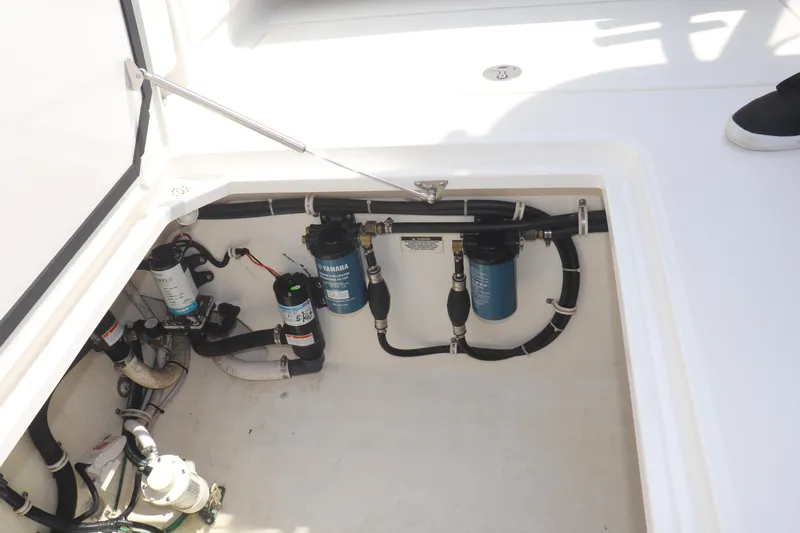 Reel Grateful Yacht Photos Pics 2021 Albemarle 31 DC boat compartment with Yamaha filters and hoses.