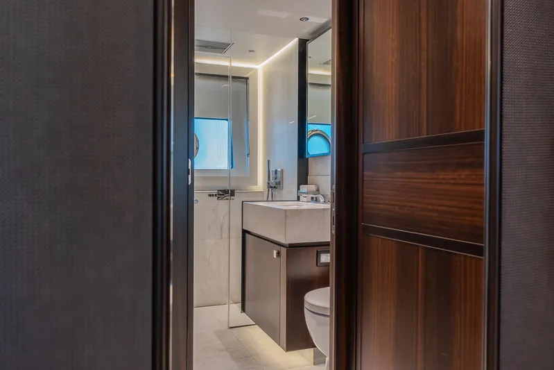  Yacht Photos Pics Luxurious bathroom interior on 2025 Sunseeker 90 Ocean yacht, featuring modern design and elegant finishes.