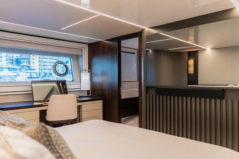  Yacht Photos Pics Luxurious interior of 2025 Sunseeker 90 Ocean yacht with modern design and large window view.