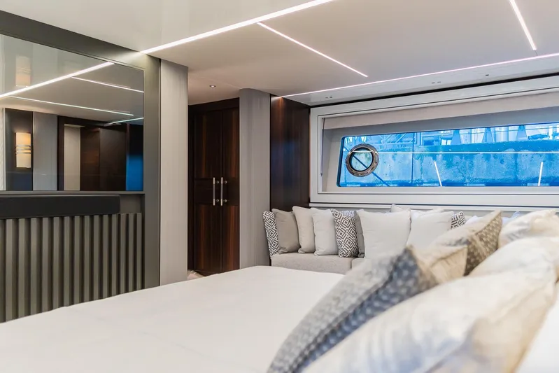  Yacht Photos Pics Luxurious interior of 2025 Sunseeker 90 Ocean yacht with modern design and plush seating.