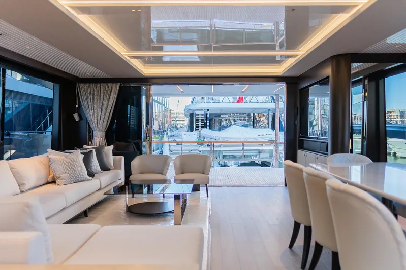  Yacht Photos Pics Luxurious interior of 2025 Sunseeker 90 Ocean yacht with elegant seating and modern design.