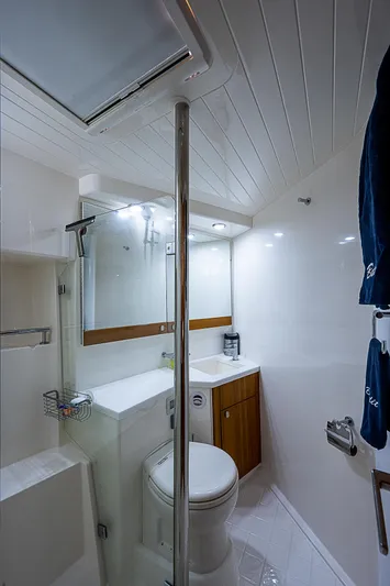 Reel Rodeo Yacht Photos Pics 2014 Maritimo 470 Offshore Convertible yacht bathroom with modern fixtures.