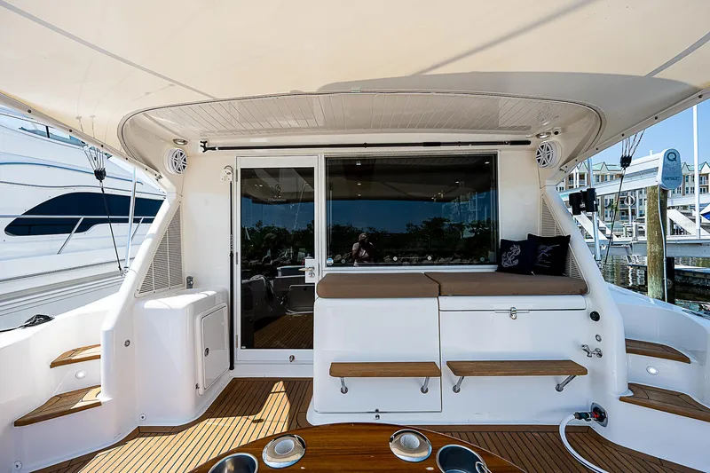 Reel Rodeo Yacht Photos Pics 2014 Maritimo 470 Offshore Convertible yacht deck with seating and storage.