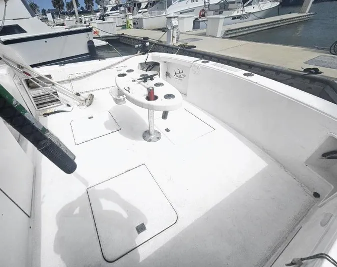 Badfish Yacht Photos Pics 1998 Ocean Yachts 40 Super Sport fishing deck at marina.