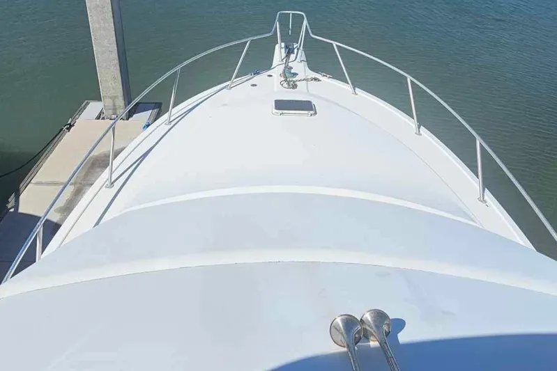 Badfish Yacht Photos Pics Bow view of a 1998 Ocean Yachts 40 Super Sport docked.