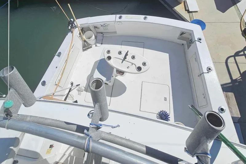 Badfish Yacht Photos Pics 1998 Ocean Yachts 40 Super Sport fishing deck with rod holders and tackle station.