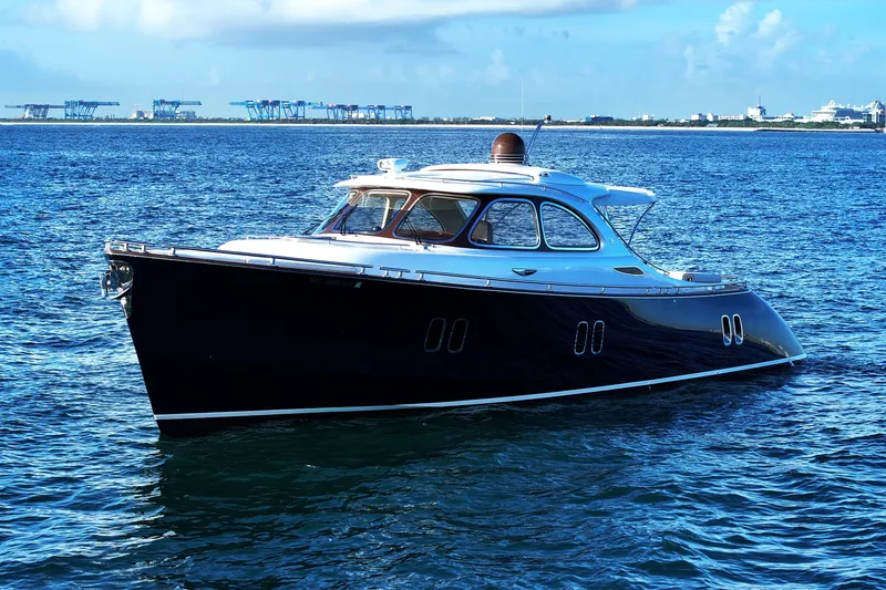 Our Trade Yacht Photos Pics Luxurious 2013 Zeelander Z44 yacht cruising on serene blue waters.