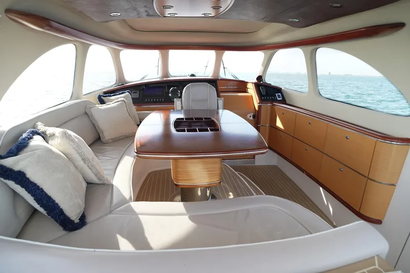 Our Trade Yacht Photos Pics Luxurious interior of 2013 Zeelander Z44 yacht with elegant wood finishes and plush seating.