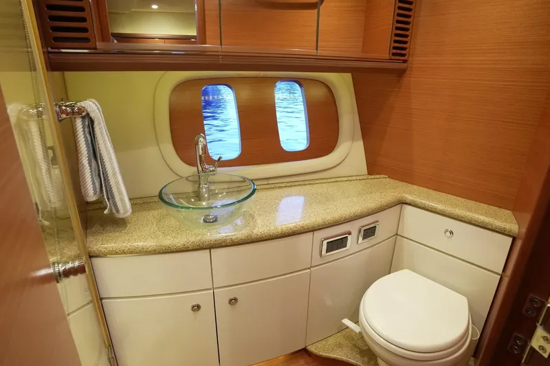 Our Trade Yacht Photos Pics Luxurious bathroom interior of 2013 Zeelander Z44 yacht with elegant fixtures and ocean view.