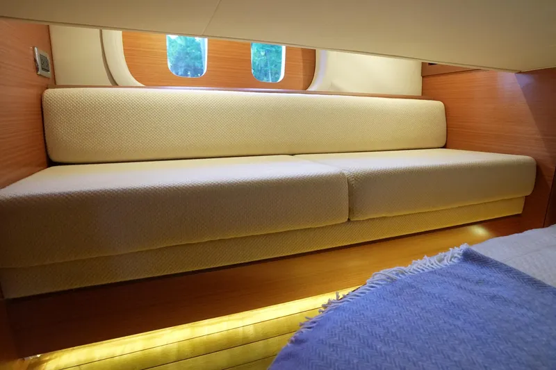 Our Trade Yacht Photos Pics Luxurious interior of 2013 Zeelander Z44 yacht with elegant seating and ambient lighting.