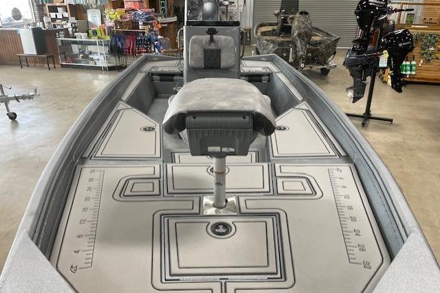 2026 Excel 220 Bay Pro Elite boat interior with seating and storage compartments.