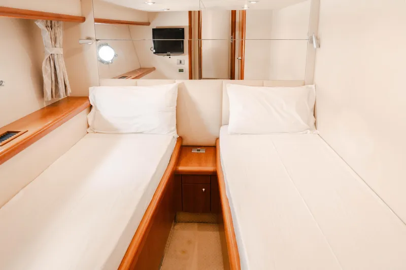  Yacht Photos Pics Luxurious twin cabin interior on 2008 Sunseeker Manhattan 60 yacht.