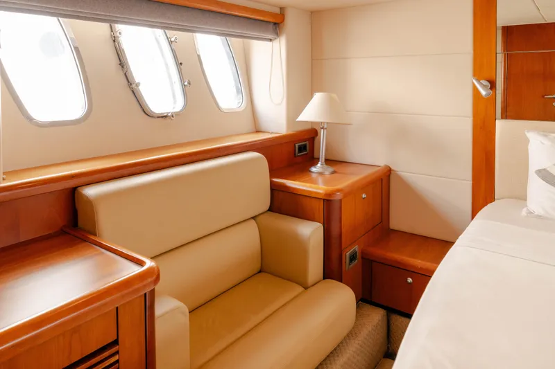  Yacht Photos Pics Luxurious interior of 2008 Sunseeker Manhattan 60 yacht with elegant wood and leather finishes.