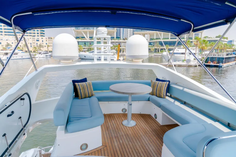 Yacht Photos Pics Luxurious 2008 Sunseeker Manhattan 60 yacht with spacious outdoor seating and scenic marina view.