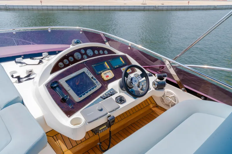  Yacht Photos Pics Cockpit of 2008 Sunseeker Manhattan 60 yacht with modern navigation equipment.