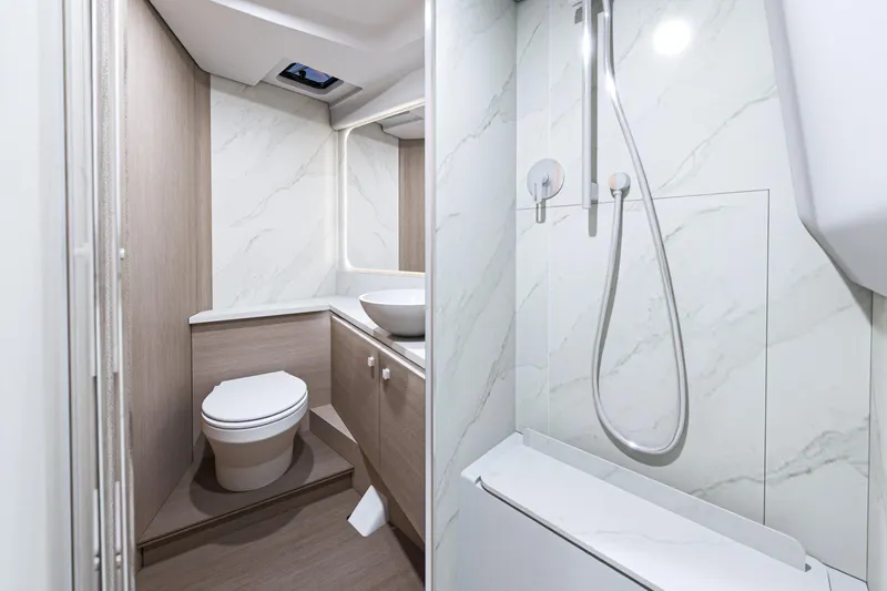  Yacht Photos Pics Modern bathroom in 2026 Beneteau Gran Turismo 40 yacht, featuring sleek design and elegant fixtures.