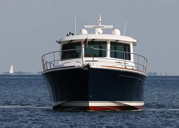 Skydog Yacht Photos Pics 2017 Sabre 48 Salon Express yacht on open water, front view.