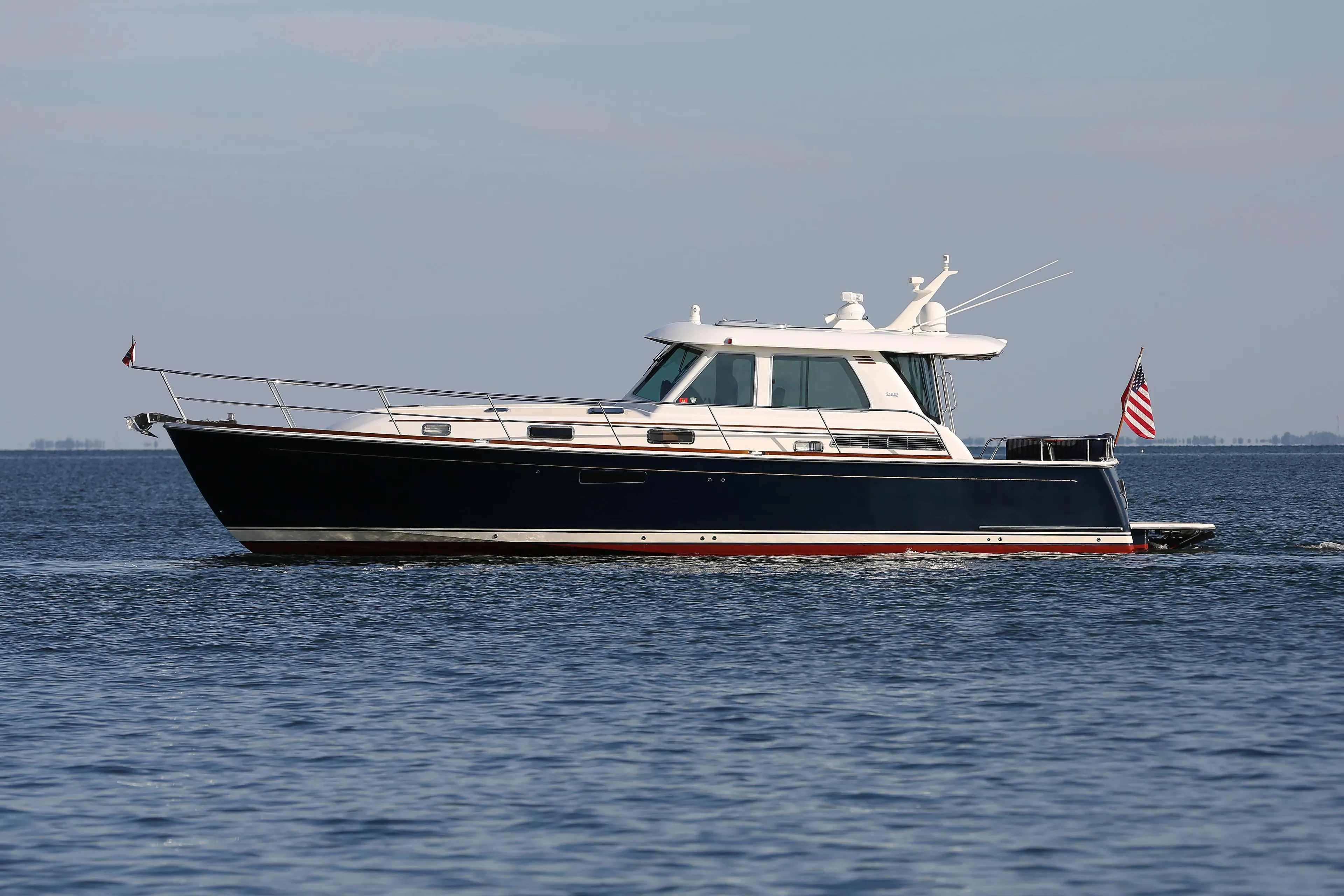 2017 Sabre 48 Salon Express yacht cruising on open water.
