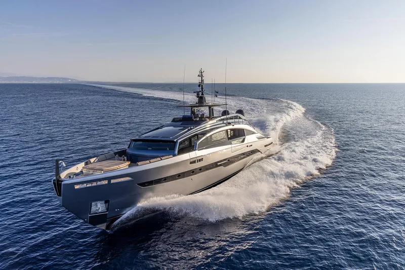  Yacht Photos Pics 2025 Pershing GTX116 yacht cruising on open sea, showcasing sleek design and luxury.