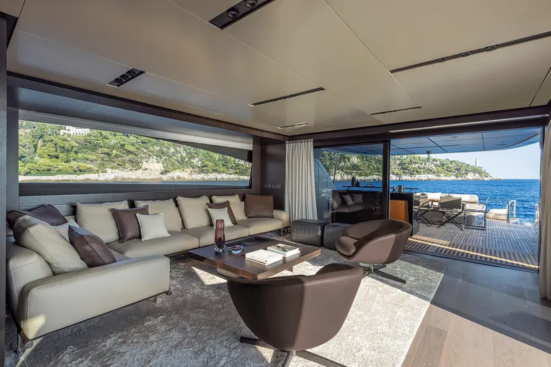  Yacht Photos Pics Luxurious interior of 2025 Pershing GTX116 yacht with ocean view and elegant seating.