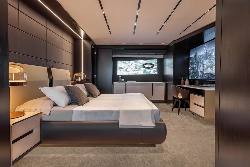  Yacht Photos Pics Luxurious bedroom interior on 2025 Pershing GTX116 yacht, featuring modern design and elegant furnishings.