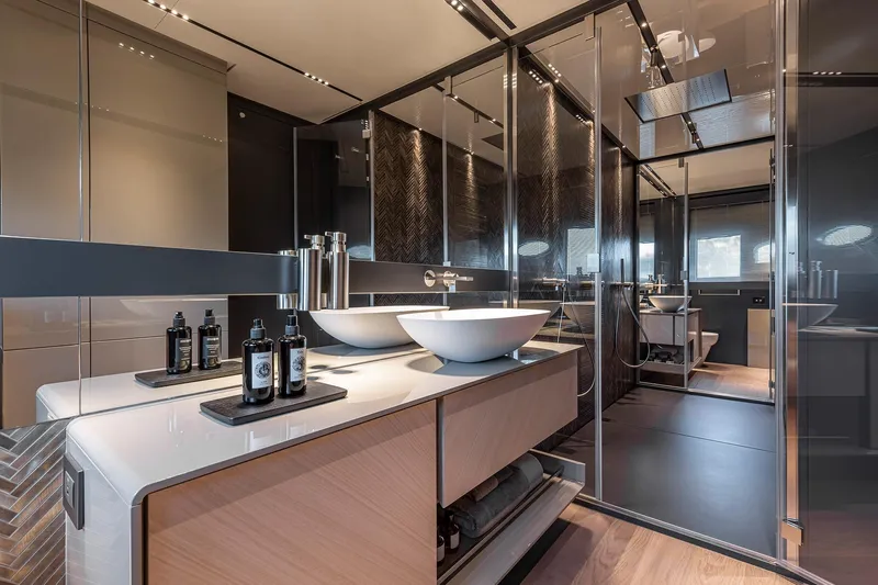  Yacht Photos Pics Luxurious bathroom interior on 2025 Pershing GTX116 yacht, featuring modern design and elegant fixtures.