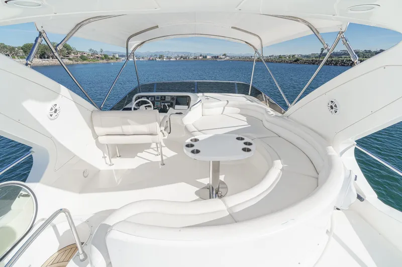  Yacht Photos Pics Luxurious 2002 Azimut 58 yacht interior with elegant seating and ocean view.