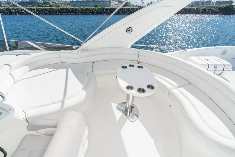  Yacht Photos Pics Luxurious seating area on a 2002 Azimut 58 yacht with ocean view.