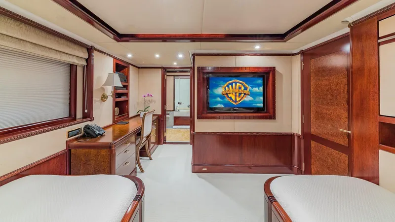 Bella Yacht Photos Pics Luxurious cabin interior of 2005 Sensation Yachts Sensation 177 with elegant wood finishes.