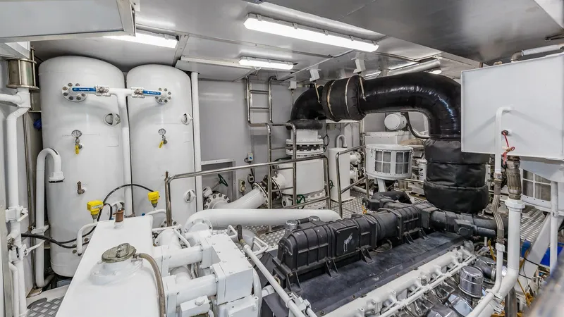 Bella Yacht Photos Pics Engine room of 2005 Sensation Yachts Sensation 177, featuring machinery and equipment.