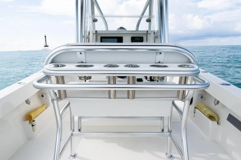  Yacht Photos Pics 2018 SeaVee 29 boat with rod holders, ocean view, and clear sky.