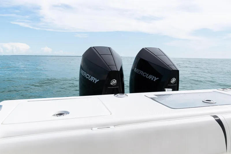  Yacht Photos Pics 2018 SeaVee 29 boat with twin Mercury outboard engines on open water.
