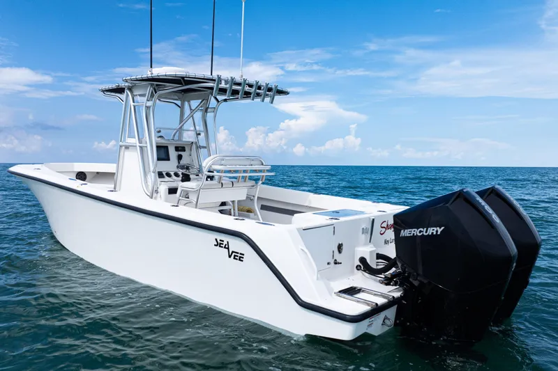 Yacht Photos Pics 2018 SeaVee 29 boat with dual Mercury engines on open sea.