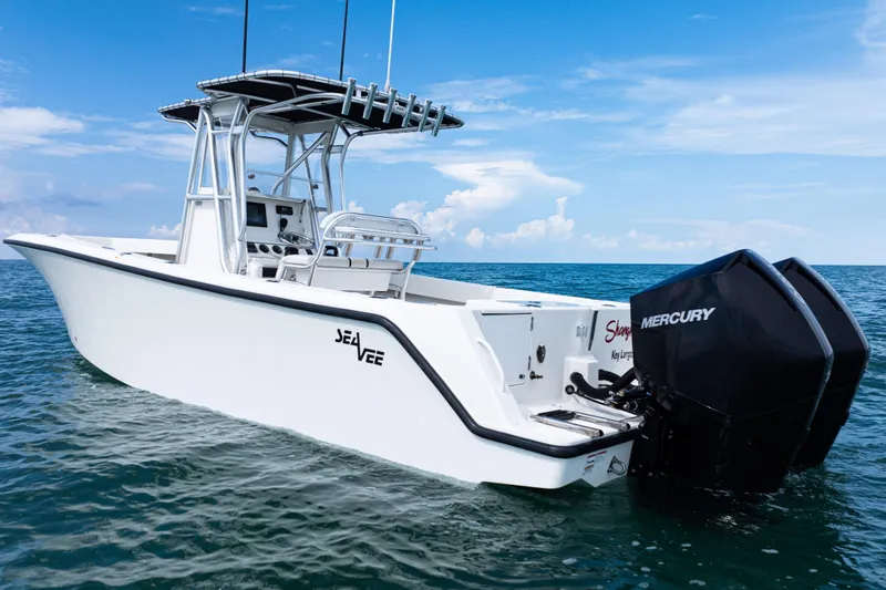  Yacht Photos Pics 2018 SeaVee 29 boat with dual Mercury engines on open water under blue sky.