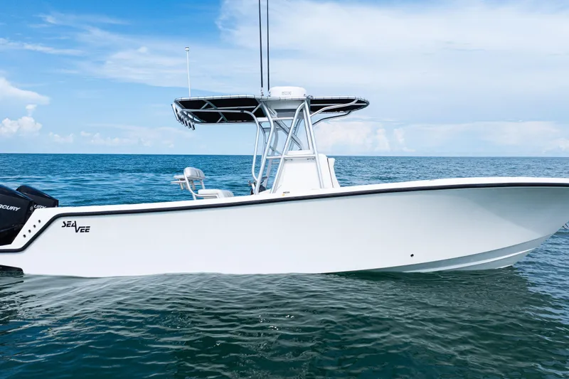  Yacht Photos Pics 2018 SeaVee 29 boat on calm ocean waters under a clear blue sky.