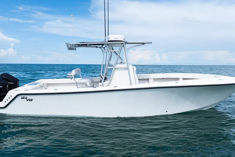  Yacht Photos Pics 2018 SeaVee 29 boat on calm ocean waters under a clear blue sky.